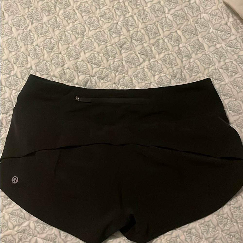 Black lulu lemon athletic shorts.